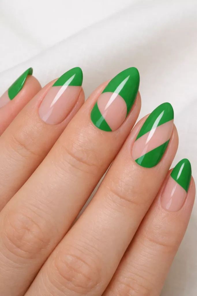 Almond nails with geometric green negative space art