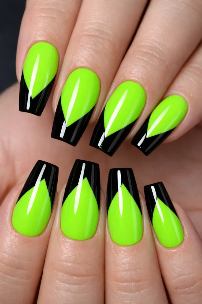 Square neon green nails with sharp black tips