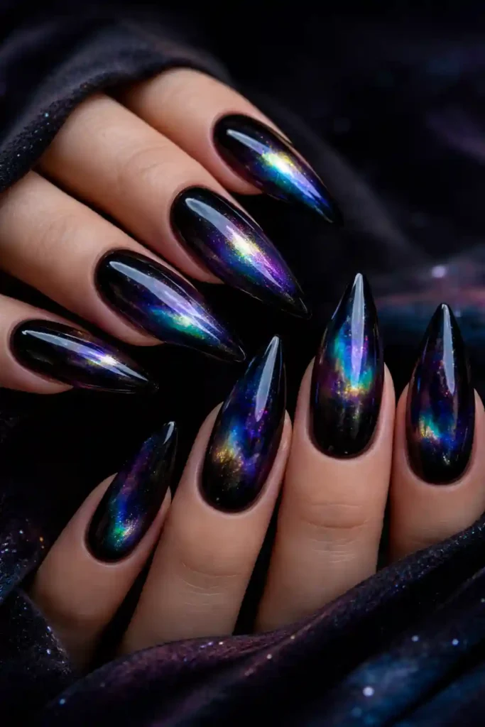 Dark aurora holographic nails with rainbow shimmer on black base