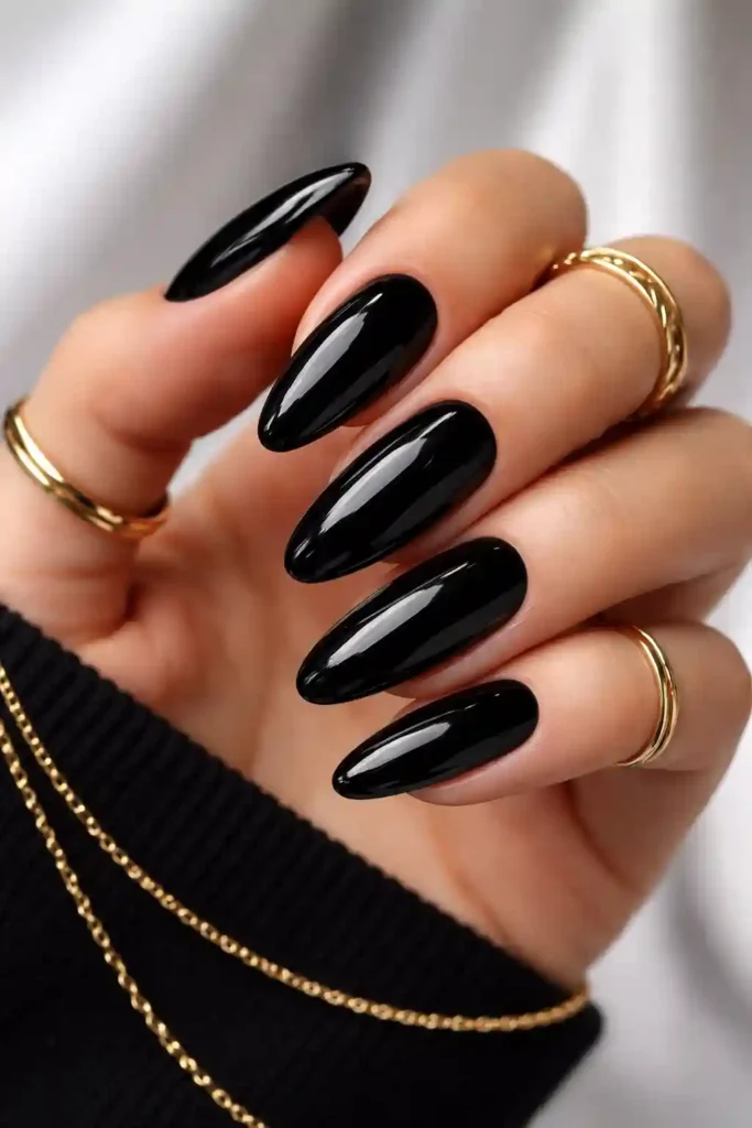 Glossy jet black manicure on square shaped nails with high shine finish