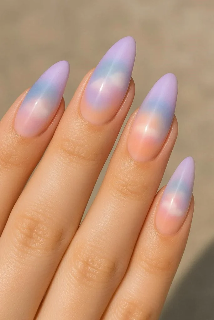 Aura acrylic nails with soft pastel lavender and peach tones