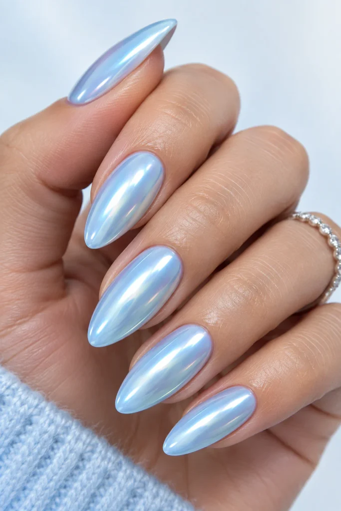 Baby blue nails with soft pearl chrome finish