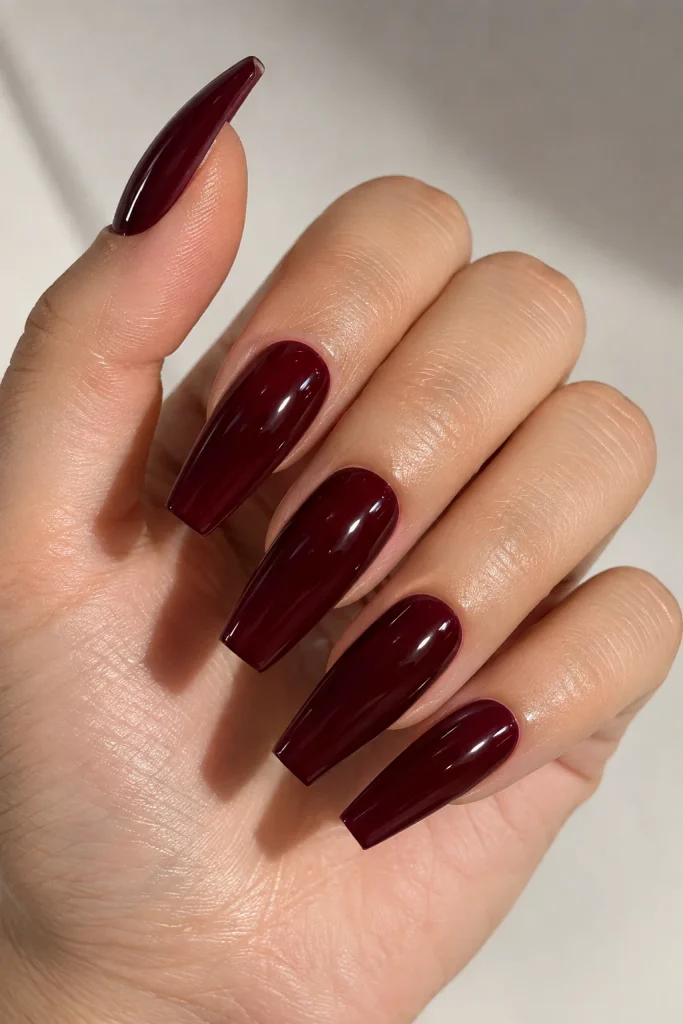 Black cherry glossy coffin nails in deep burgundy red