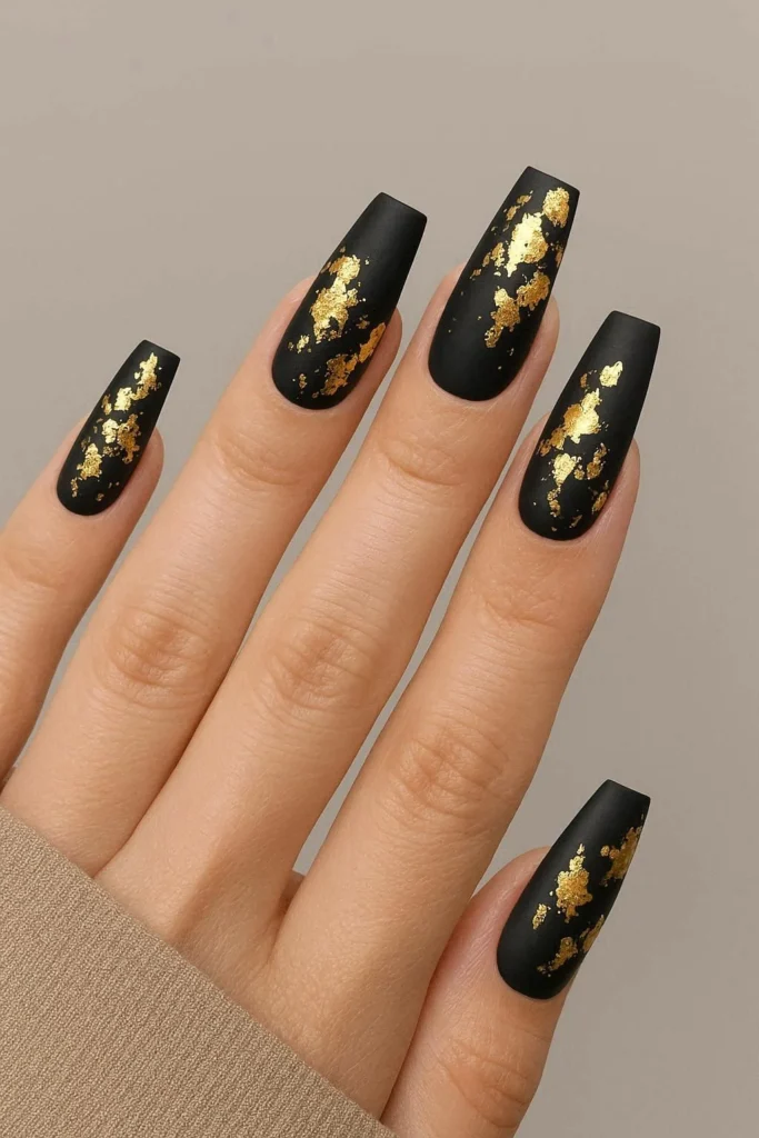 Matte black coffin acrylic nails with irregular gold foil
