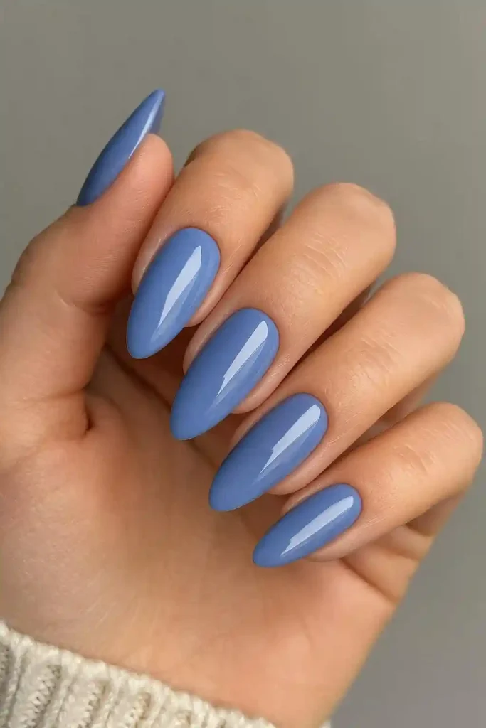 Elegant periwinkle blue nails on tapered almond shape