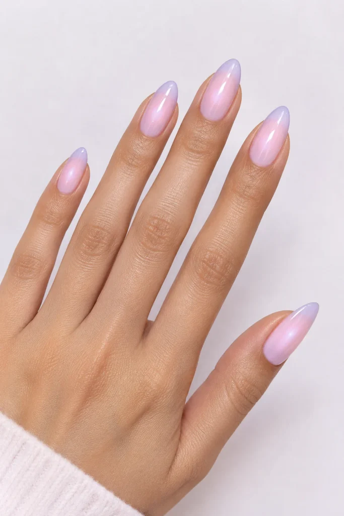 Blush pink and lilac aura gradient almond nails