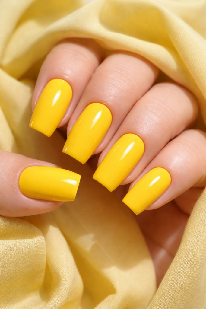 Bold solid yellow nails high gloss finish
