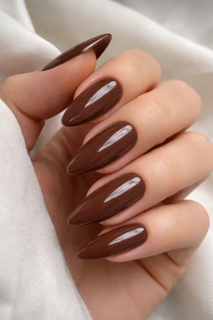 Brown acrylic almond shaped nails