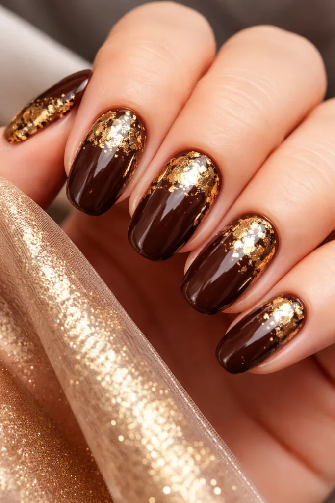 Brown nails with gold foil accent