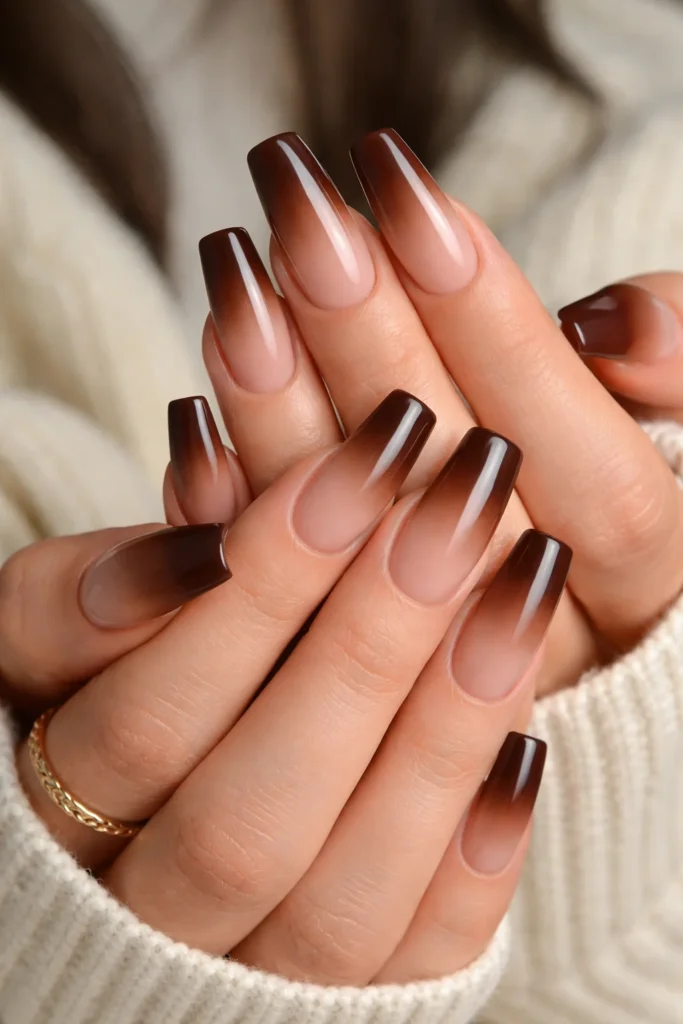 Brown ombre nails blending nude to deep brown