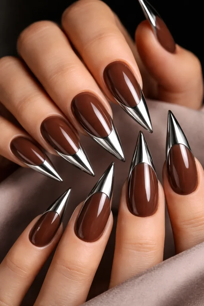 Brown stiletto nails with chrome tips