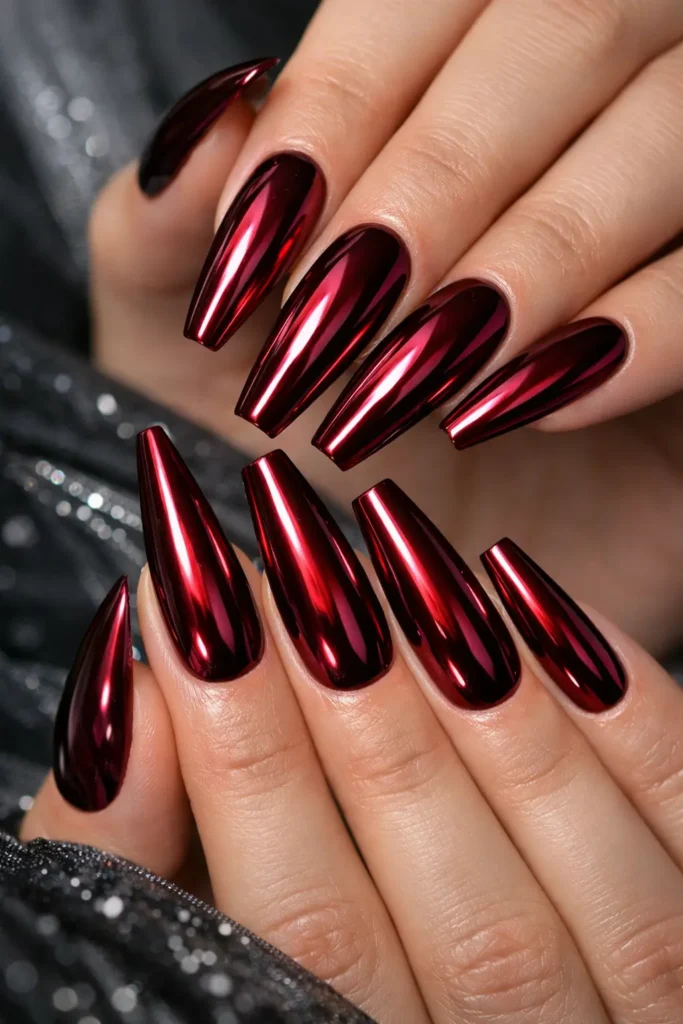Burgundy chrome mirror nails on long coffin shape