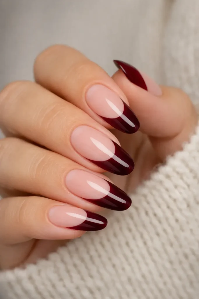 Burgundy French tip nails on coffin shape with nude base