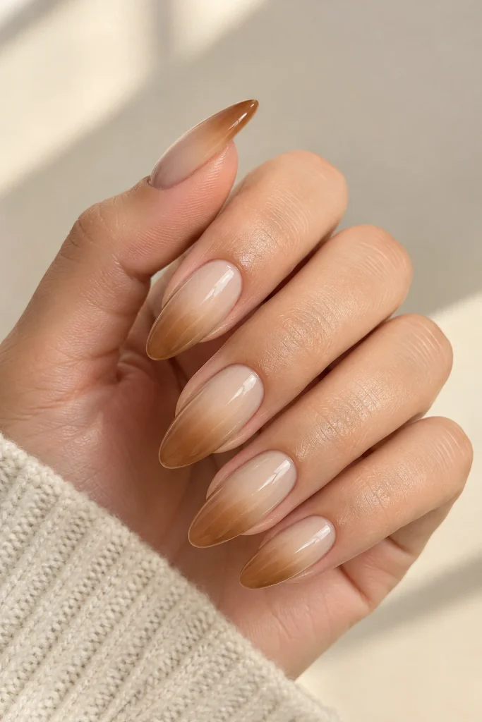 Caramel latte ombre nails fading from milky beige