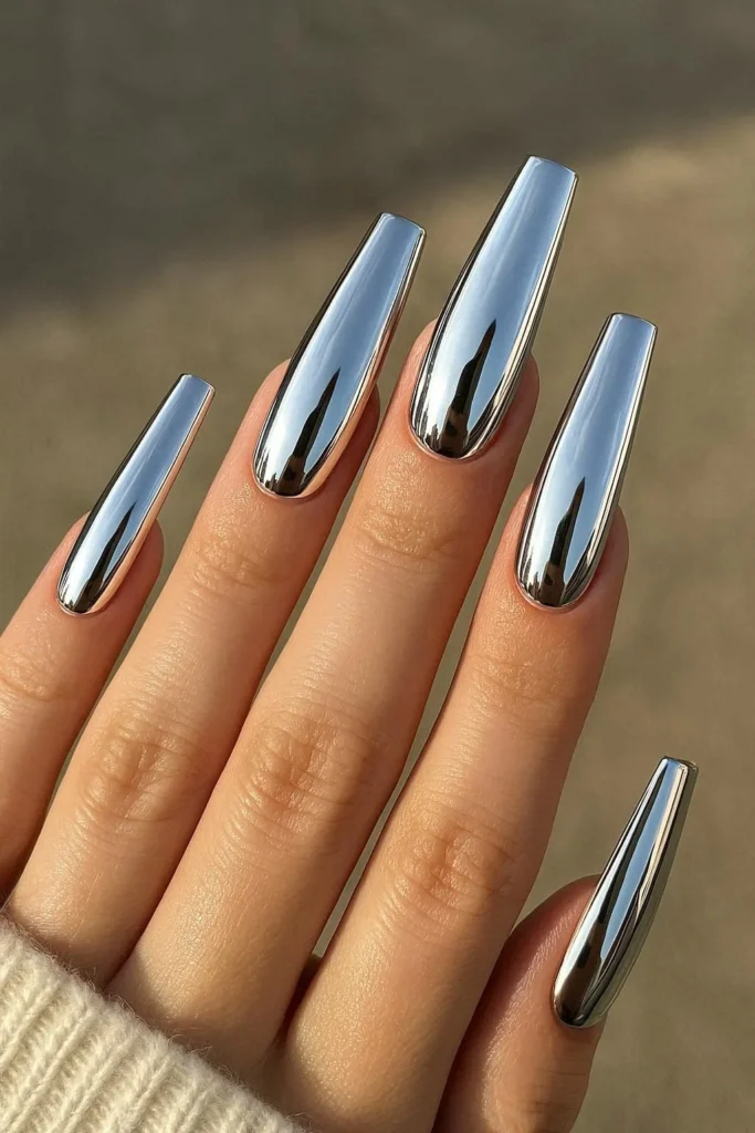 Mirror finish chrome coffin acrylic nails in rose gold