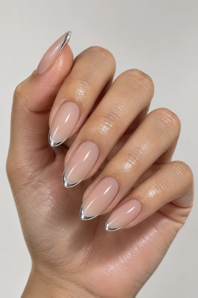 Nude minimalist nails with thin chrome edge lines