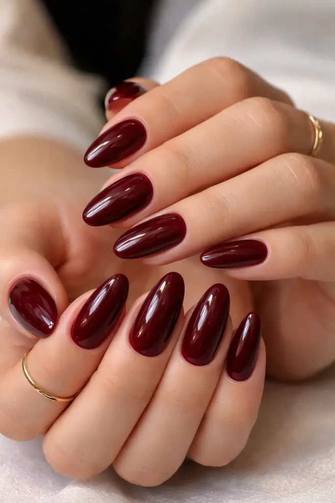 Classic glossy burgundy nails on square almond shape