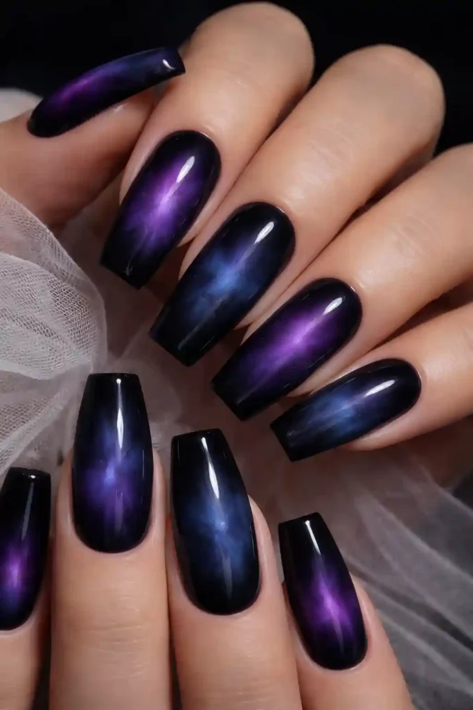 Dark aura nails with smoky purple and black blended swirls