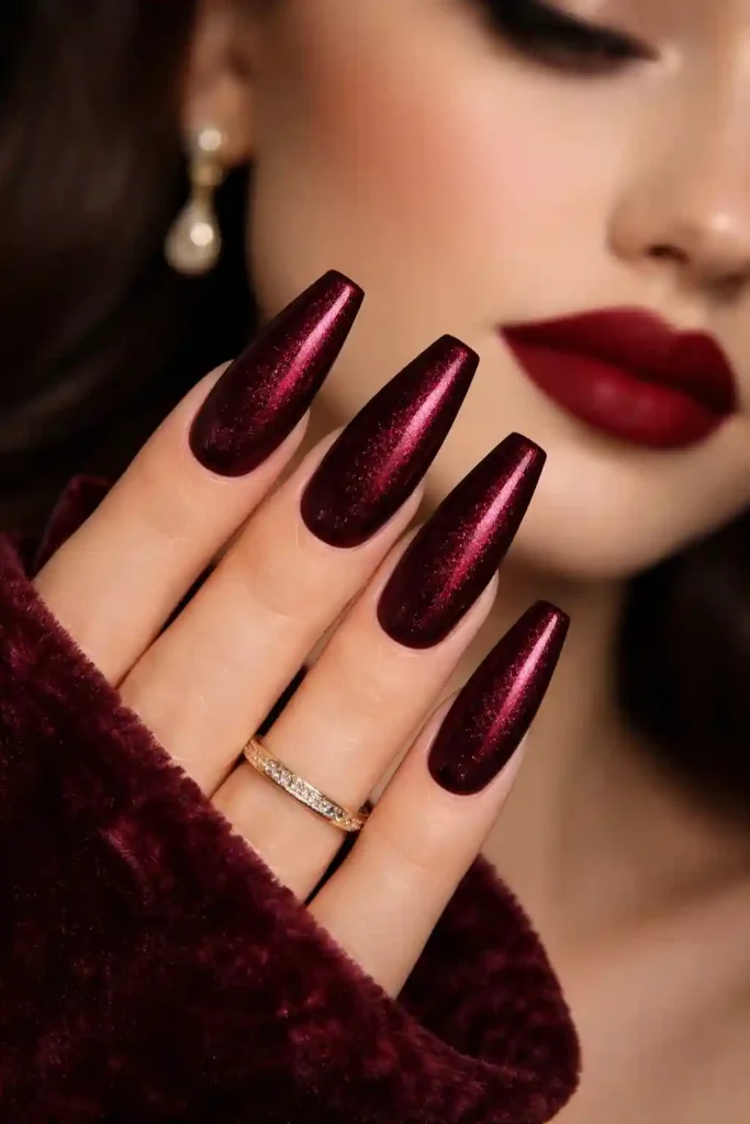 Dark burgundy velvet magnetic nails on coffin shape