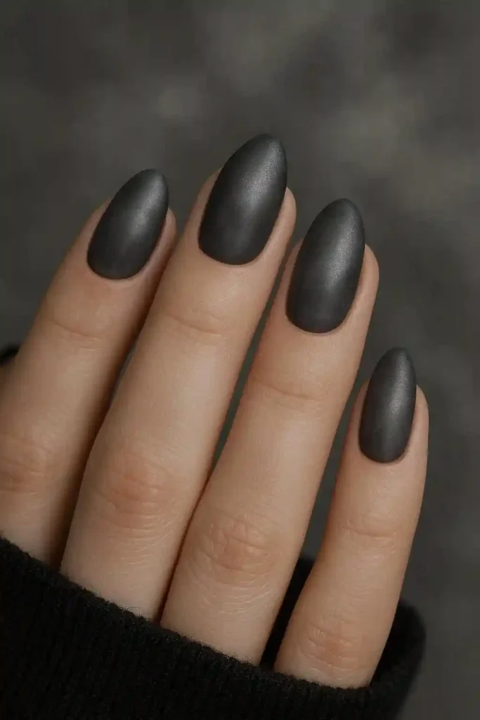 Dark smoky grey semi-matte almond nails with pearl shimmer finish