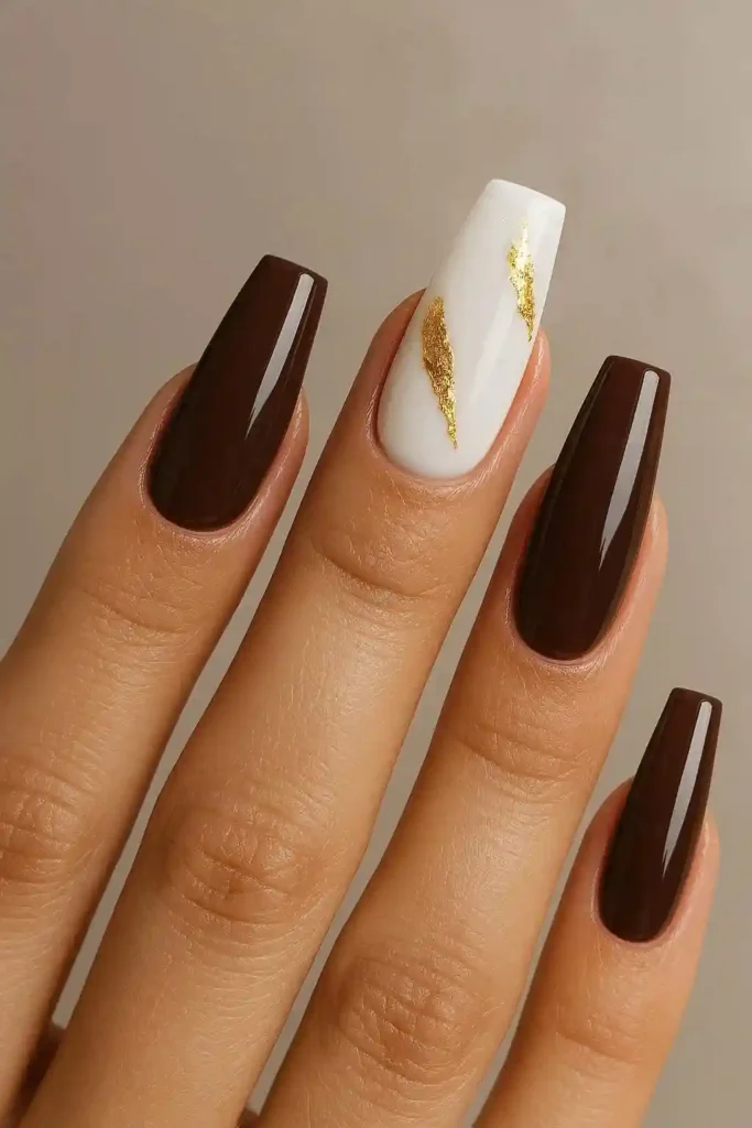Long gel coffin nails in nude with sleek glossy finish