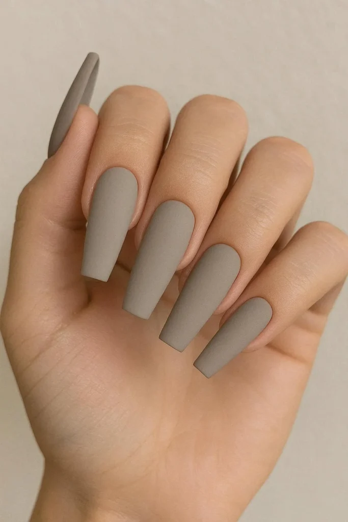 Matte greige coffin acrylic nails with velvety finish