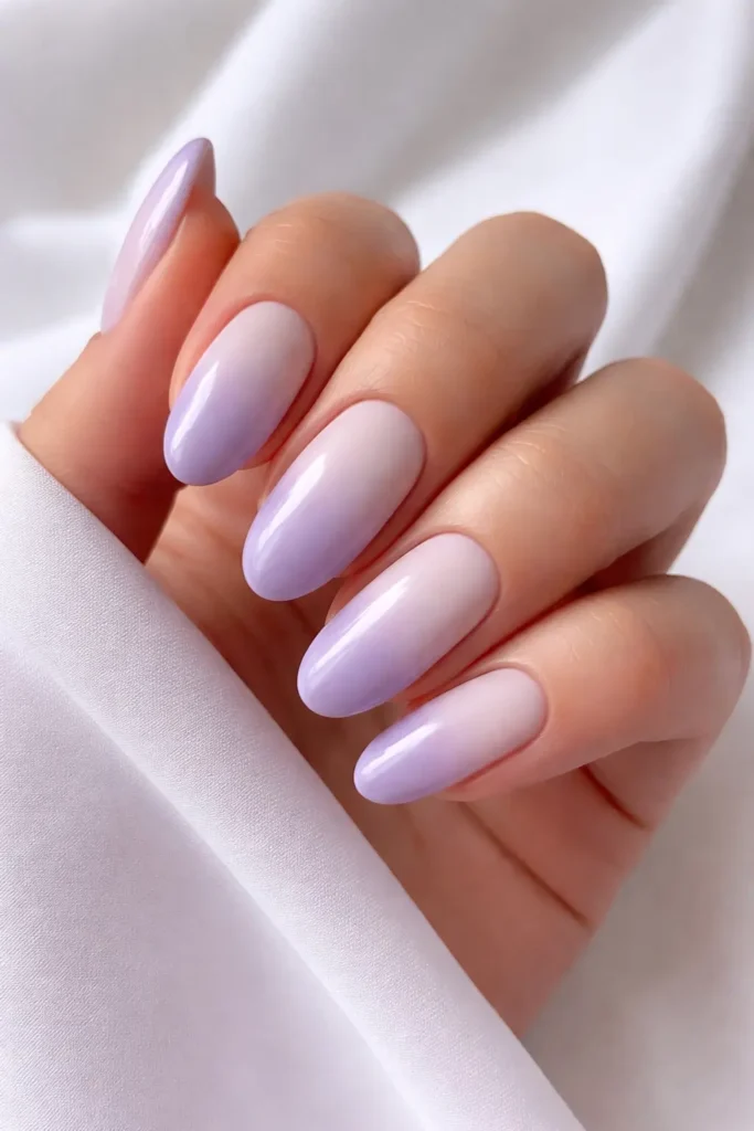 Lavender ombre fade pastel nail ideas with soft white to dusty purple gradient