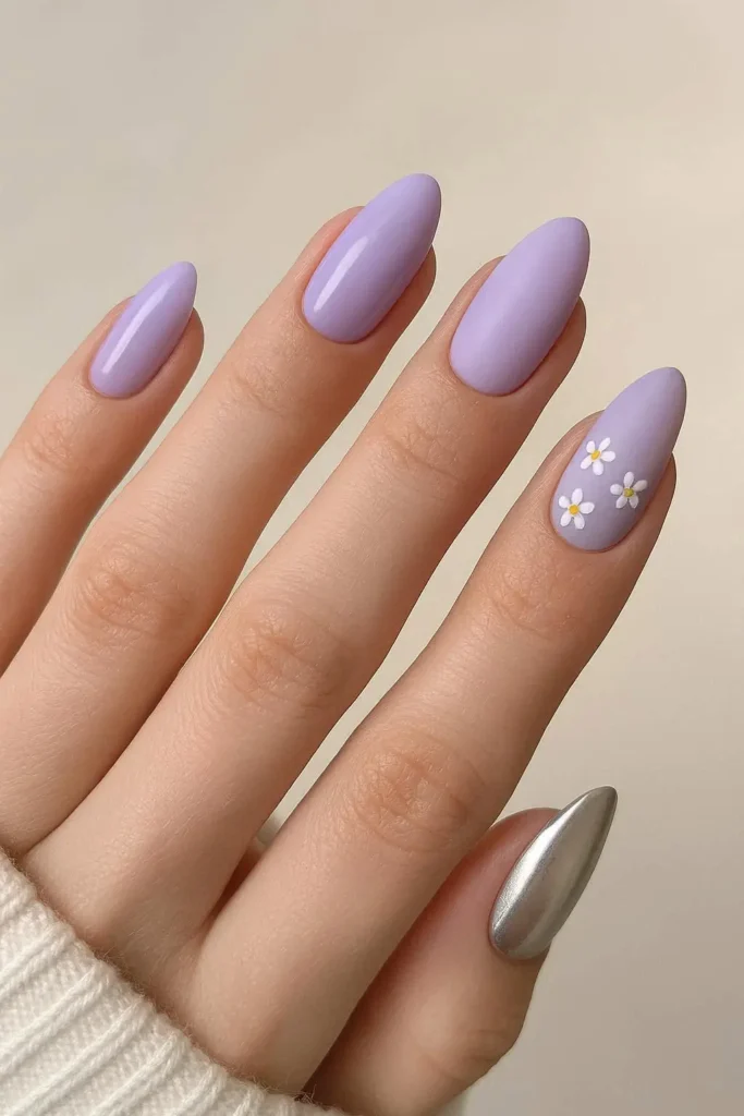 Glossy lavender spring nails on almond-shaped nails with a soft purple pastel finish
