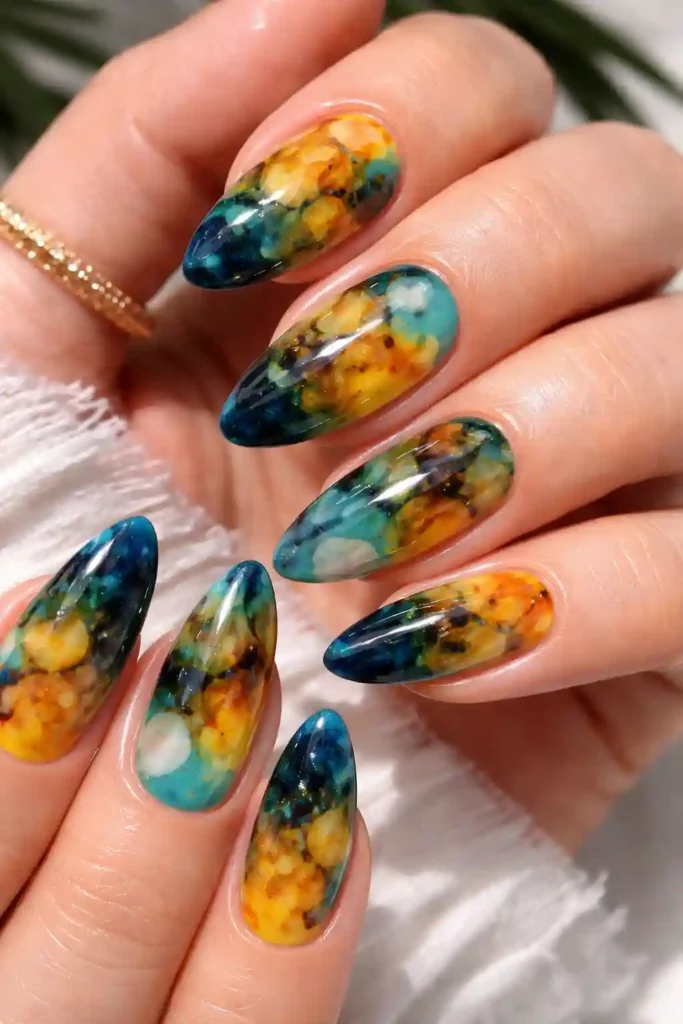 lemon yellow and teal blue tortoiseshell abstract nail art