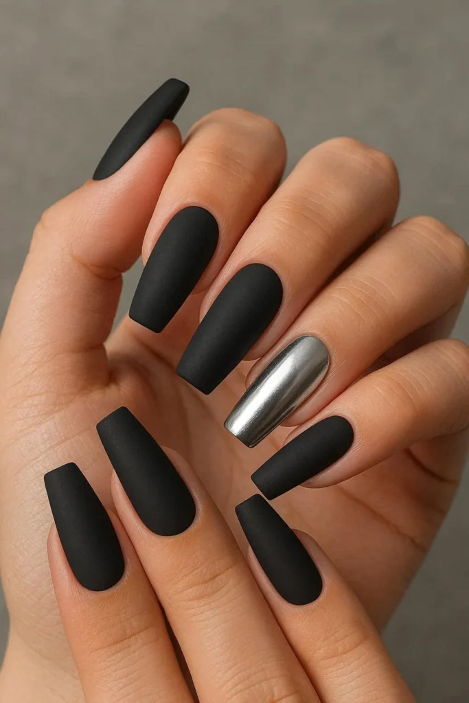 Matte black coffin nails with silver chrome accent nail