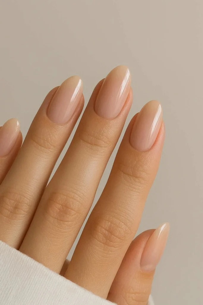 Medium almond minimalist acrylic nails in sheer nude
