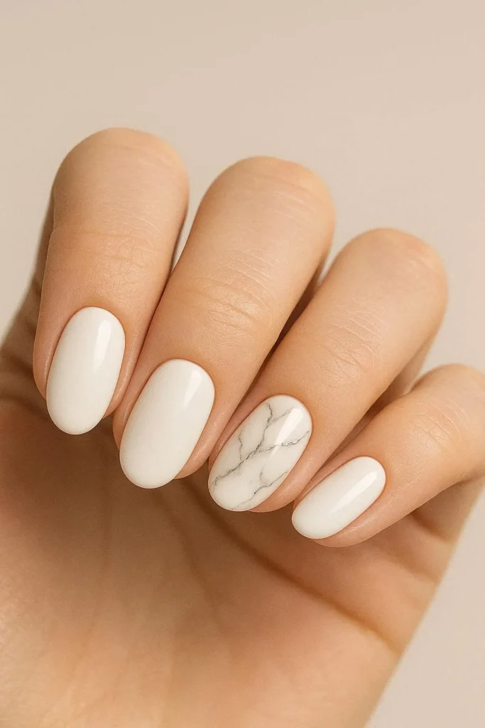 Soft marble accent nail on plain white nail set
