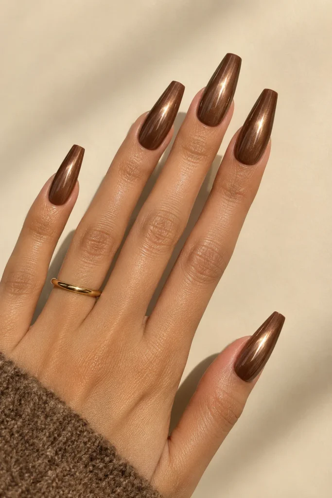 Mocha brown coffin nails with soft pearl chrome finish