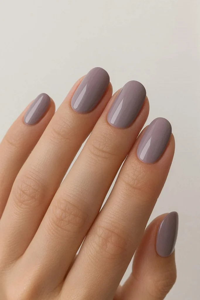 Pretty but not predictable. Muted lavender nails are the soft, cool-toned end of summer shade your manicure has been missing.