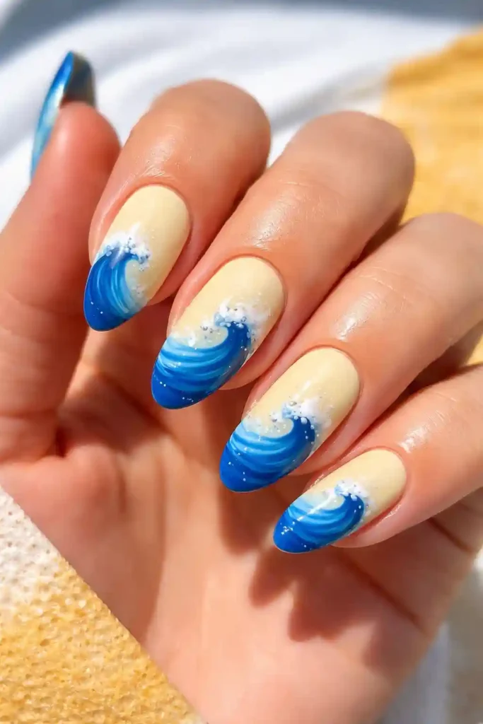 royal blue wave-shaped French tips on lemon yellow nails