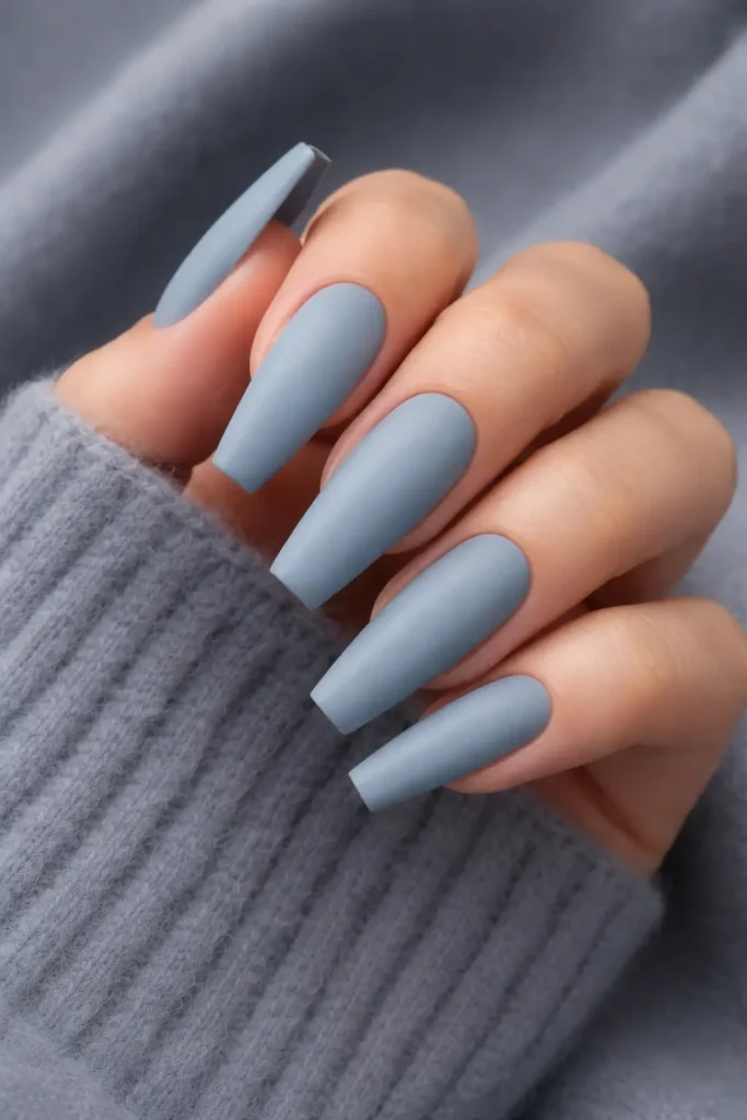 Pastel blue coffin nail ideas with dusty smoky finish on long coffin shaped nails