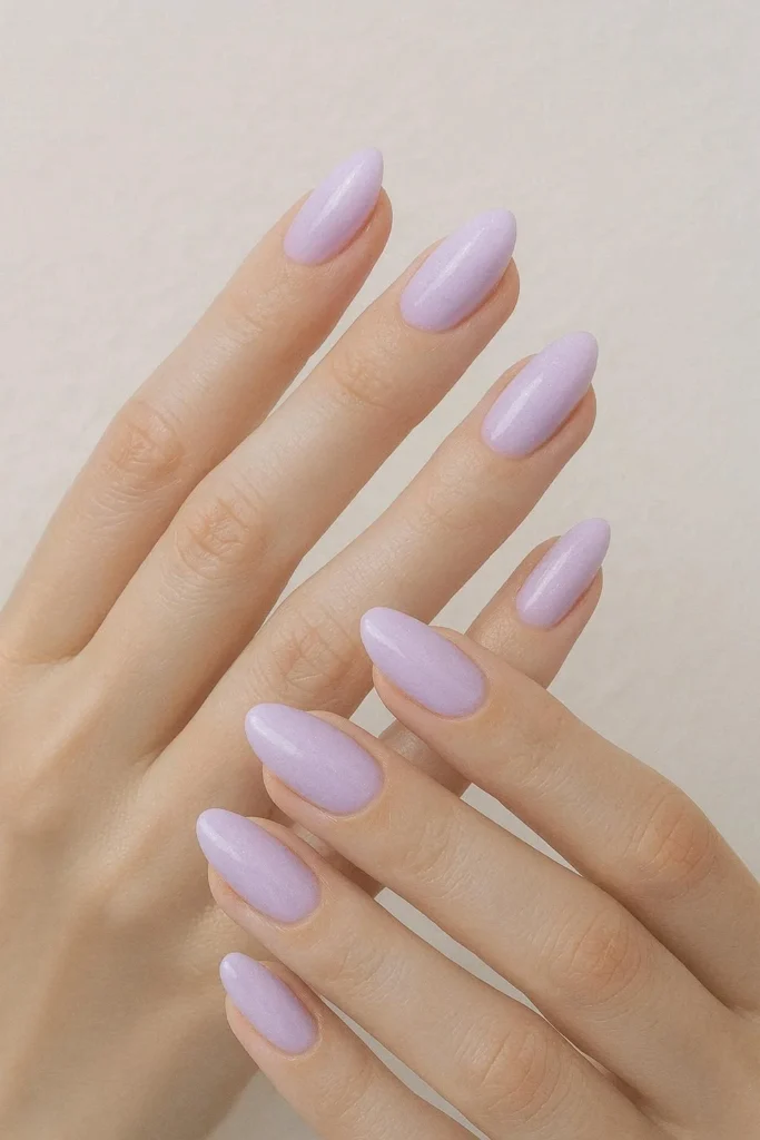 Pastel lavender nails with a soft dreamy purple finish
