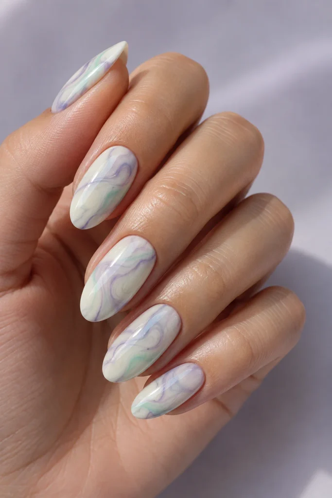Pastel lilac mint marble nails with cream base