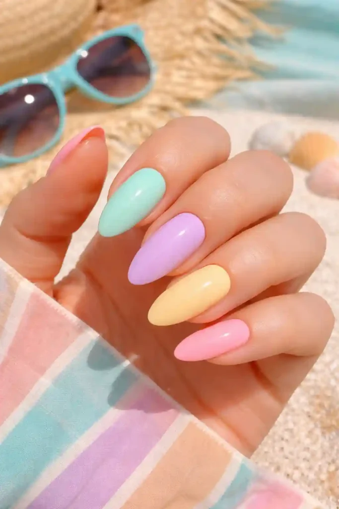 Pastel summer almond nails in lavender mint and coral shades
