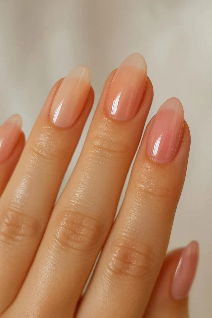 Sheer jelly nails in soft pink glossy finish

