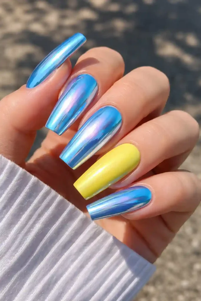 holographic sky blue chrome nails with lemon yellow accent nail