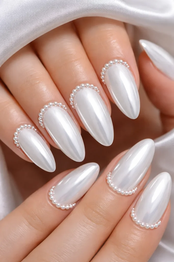 White chrome nails with micro pearl cuticle detail for birthday