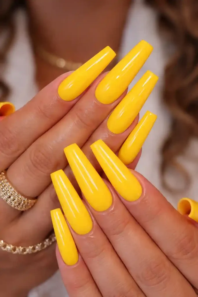 Yellow acrylic coffin nails long and glossy

