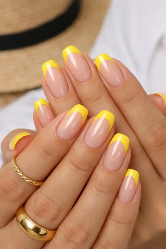 Yellow French tip nails modern style