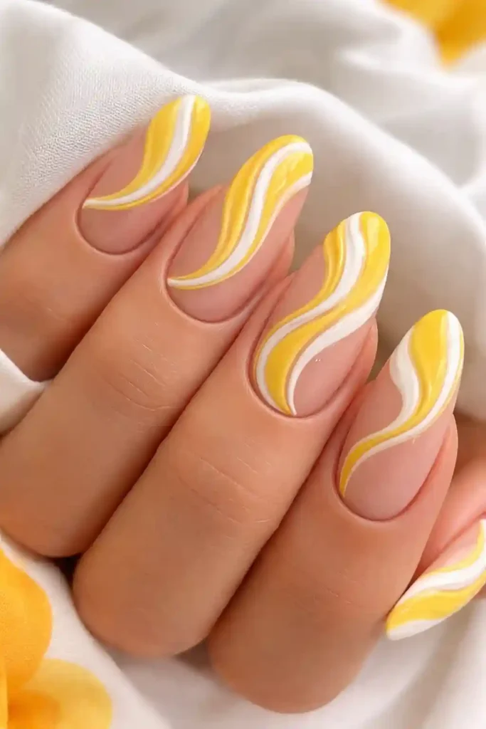 Yellow swirl nails artistic and dreamy
