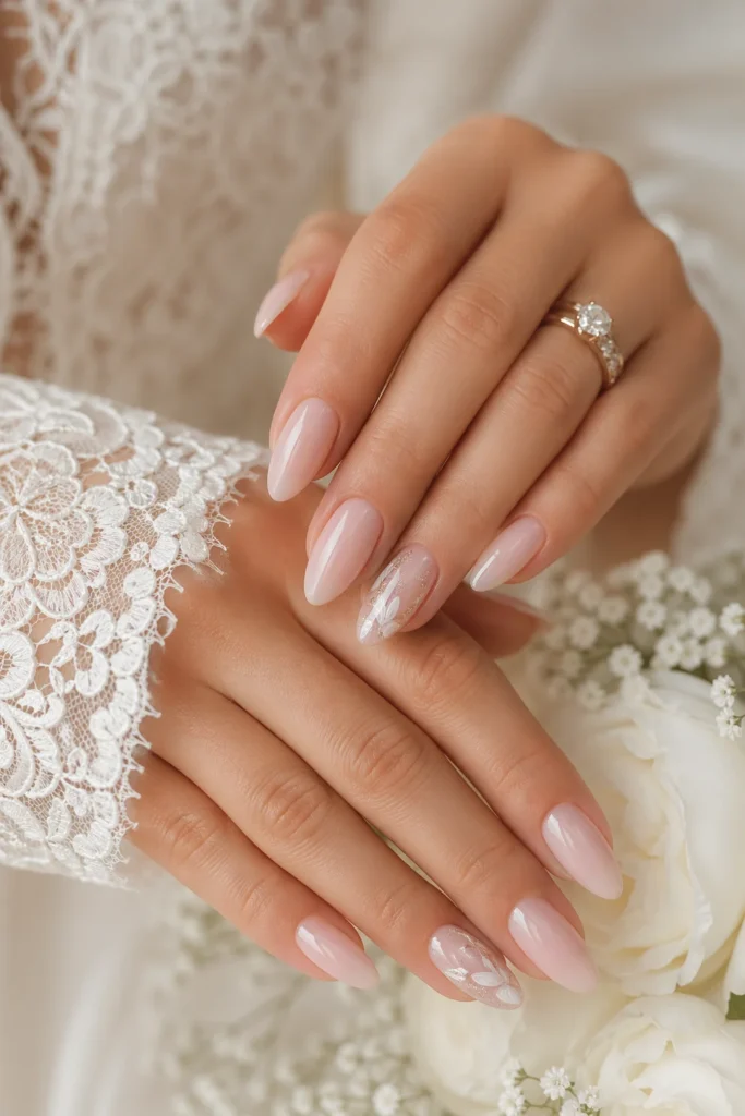 Elegant almond shaped wedding nails in soft neutral shades 
