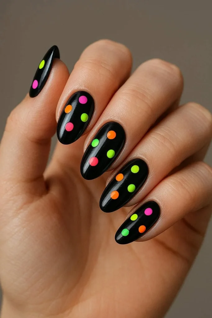  Black nails with bright neon polka dots edgy contrast design