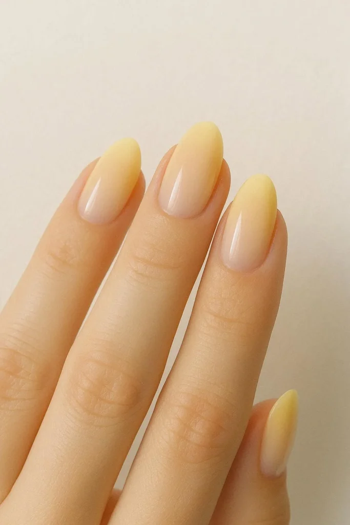  Butter yellow gradient tip nails with soft fade finish