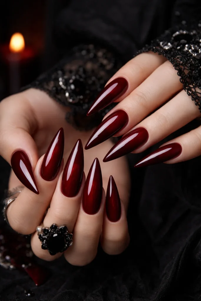 Deep glossy dark red vampire nails for Halloween season