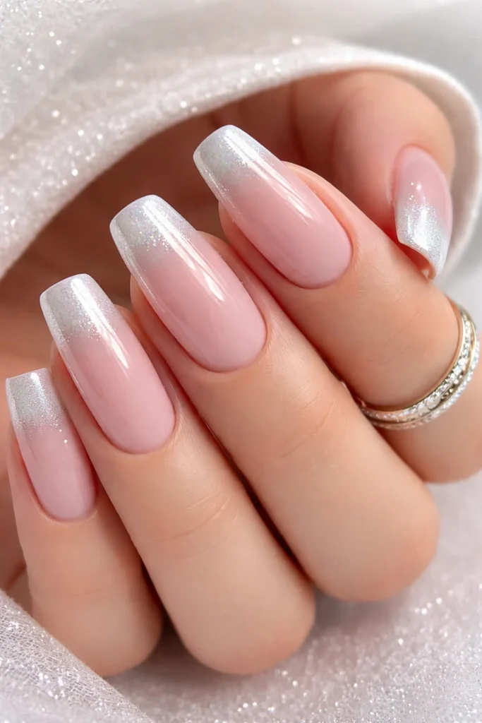 Frosted French tip nails with pearlescent shimmer winter style